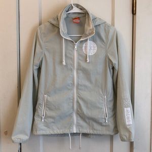 Nike mint green color rain coat.